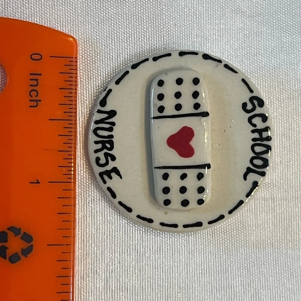 Vintage Ceramic School Nurse pin